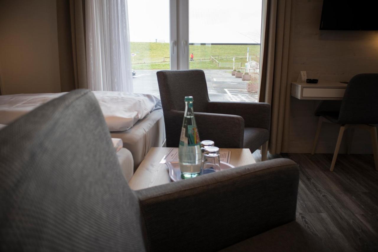 Hotel Am Friesenstrand Tossens Exterior photo